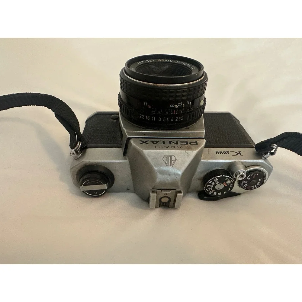 Asahi Pentax K1000 35mm SLR Film Camera with‎ SMC Pentax-M 50mm f2 Lens Silver